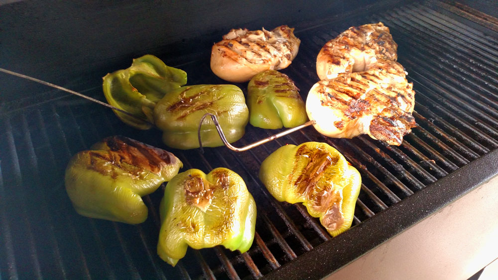 grilled chicken and peppers on a Kuma grill