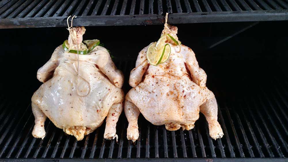 Hanging chicken on the Kuma grill